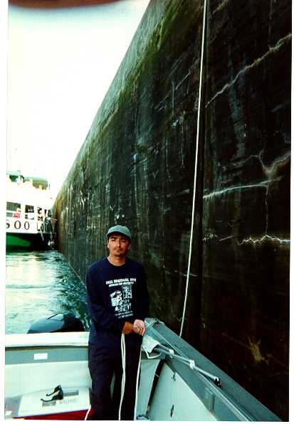 Tending a line, check out the swirling water in the lock